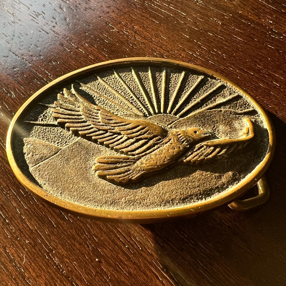 Vintage BTS solid brass flying eagle belt buckle. Made in USA
